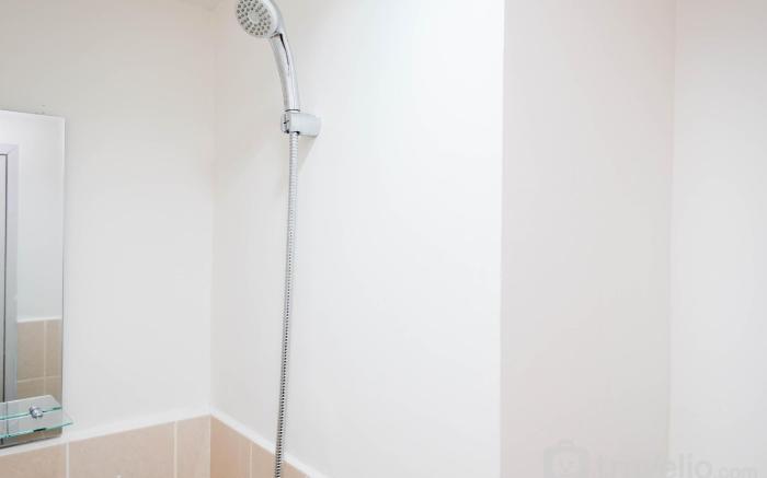 ComfortHomey 2BR at Podomoro Golf View By Travelio