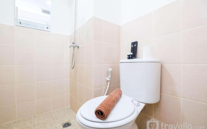 ComfortHomey 2BR at Podomoro Golf View By Travelio