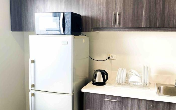 Two-Bedroom Gilmore Tower near Robinsons Magnolia