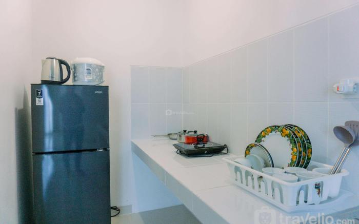 Modern Look Spacious 1BR at Neo Soho By Travelio