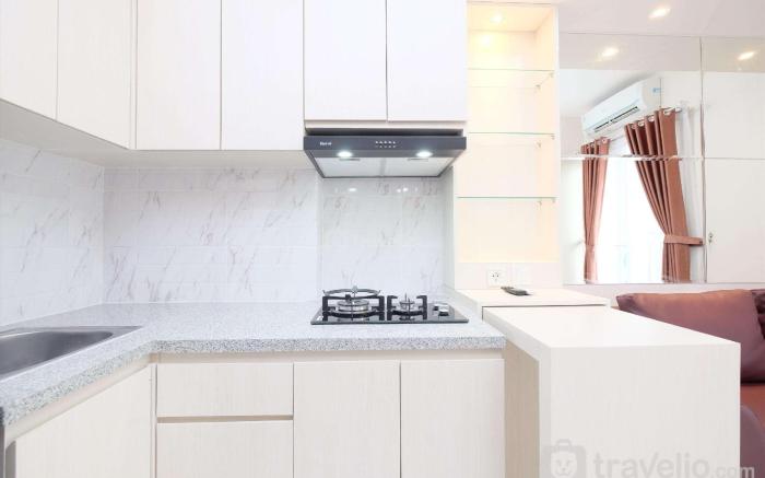 Comfort 2BR Apt at Podomoro Golf View By Travelio