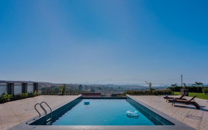 StayVista at Breezy Whispers