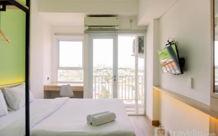 Homey and Cozy Living Studio Poris 88 By Travelio