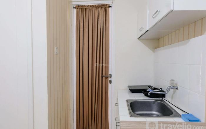 Homey 2BR Apt at Parahyangan Residence By Travelio