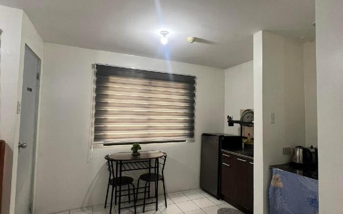 Cozy-Relaxing Condo near Enchanted Kingdom (Woody)