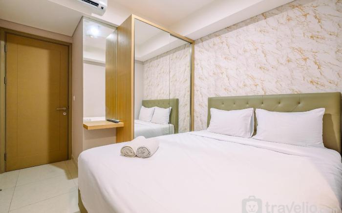 Comfort and Modern 1BR at Gold Coast By Travelio