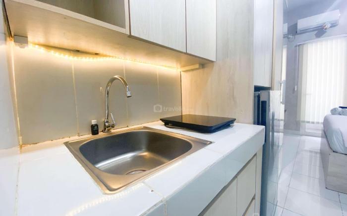 Elegant & Homey Studio at Amartha View By Travelio