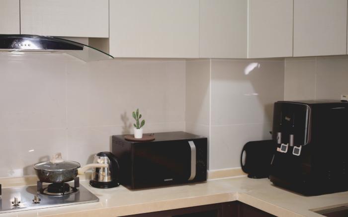 Cozy Beach Escape: 2BR Muji Gem