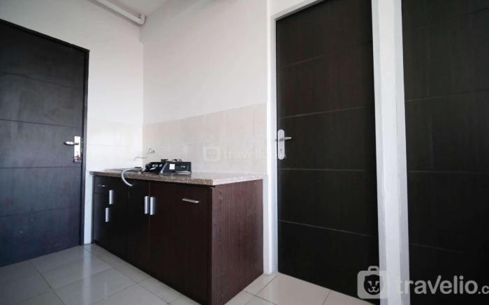 Simple 2BR Extra Bed at Menara Rungkut By Travelio