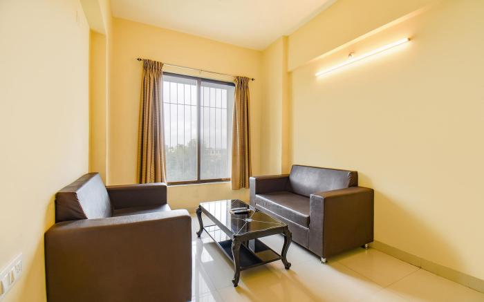 FabHotel Mountain High Inn - Nr. Lifeline Hospital