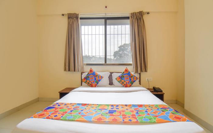 FabHotel Mountain High Inn - Nr. Lifeline Hospital