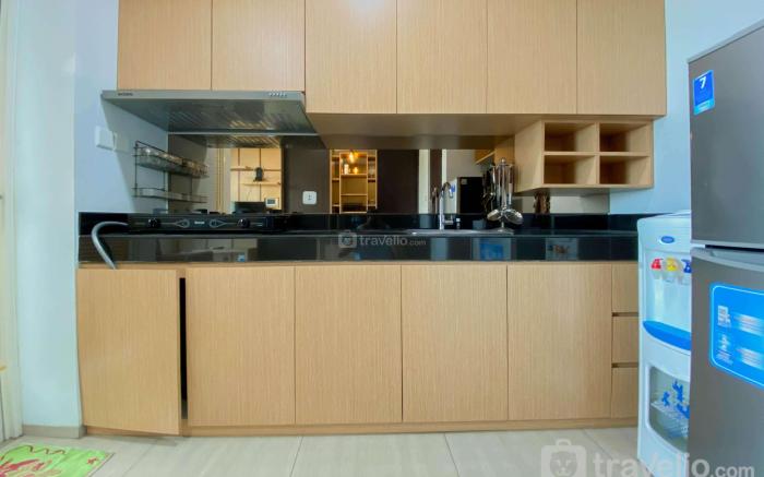 Best Deal 1BR at Citralake Suites Apt By Travelio