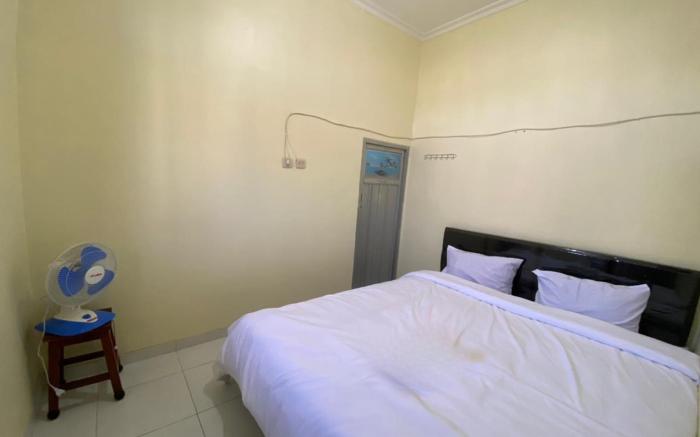 SPOT ON 93452 Wulan Homestay 2 Syariah
