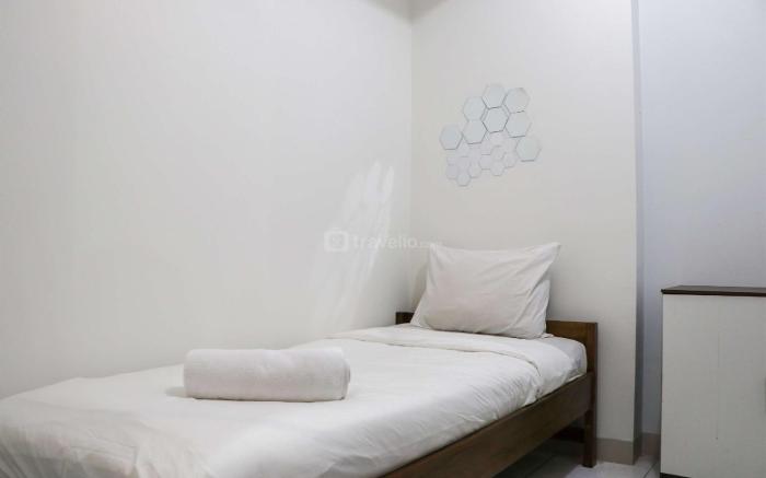 Cozy 2BR at Mekarwangi Square Apt By Travelio