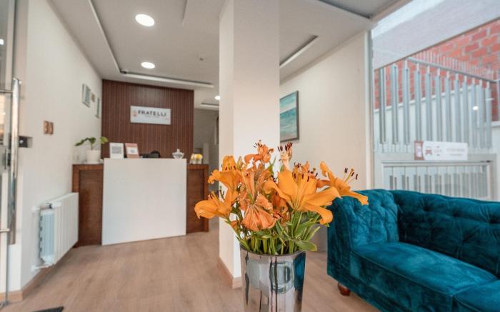 FRATELLI CORP APART HOTEL
