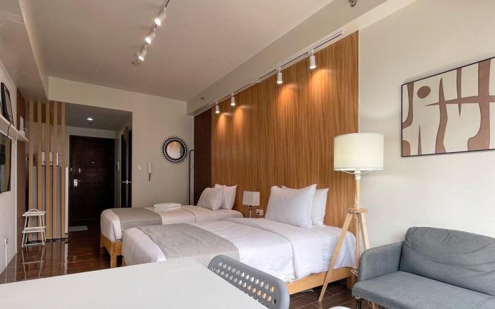 Business Luxury in a Twin Bed Suite 2X55