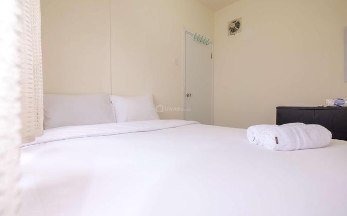 Cozy 2 BR Green Pramuka City Apartment By Travelio