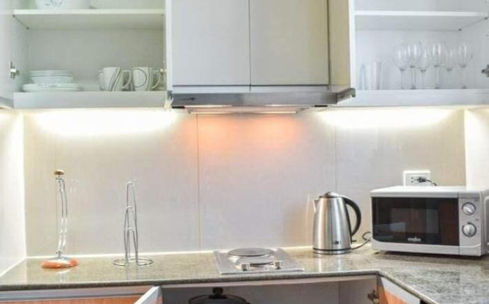 Mactan Newtown 2 BR w/ 4 beds +Pool access