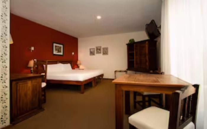 Capital O La Huerta Golf & Hotel