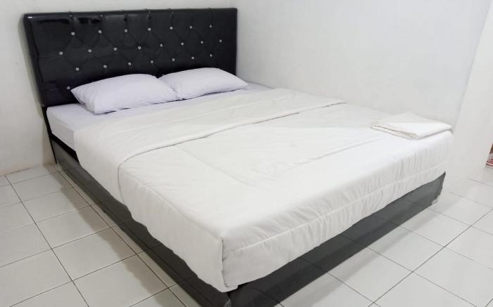 Capital O 93728 Guest House Cemara