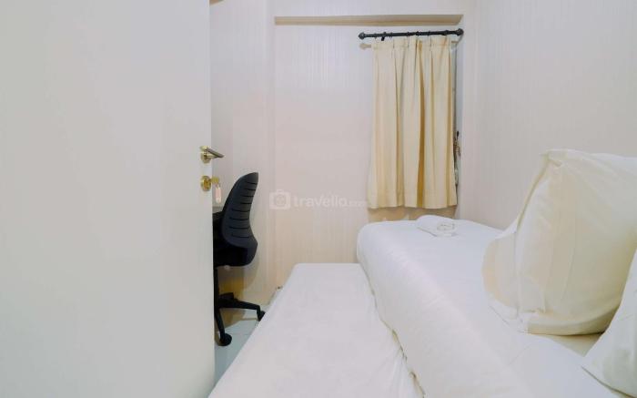 Homey 2BR at Green Pramuka City Apt By Travelio