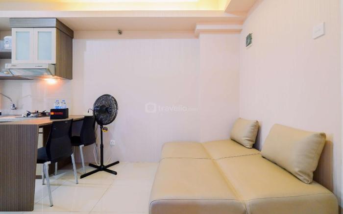 Homey 2BR at Green Pramuka City Apt By Travelio