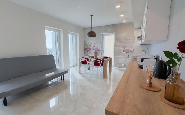 Fairmont Seafront Flamingo Suite by Ca-Sa Check