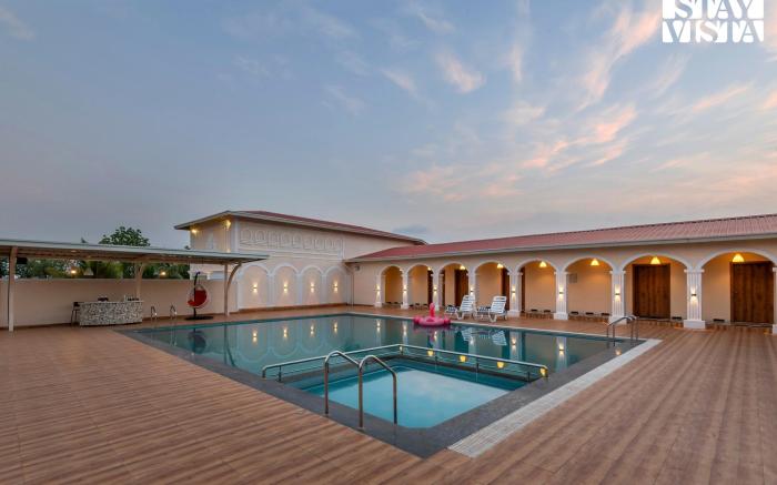 StayVista at Rio Vista with Pool, Lawn, Music Speaker & Game