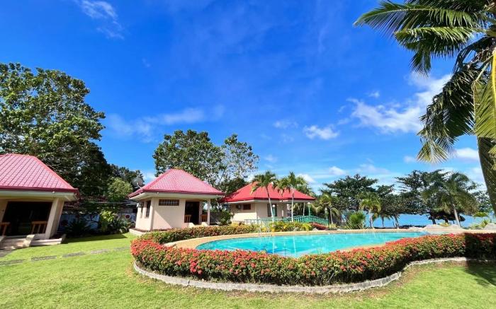 Hidden Coral Beach Club & Resort