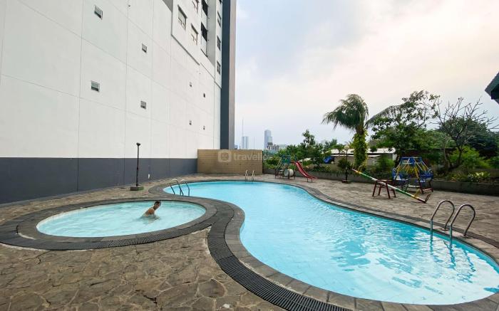 Good Place 1BR Menara Kebon Jeruk Apt By Travelio