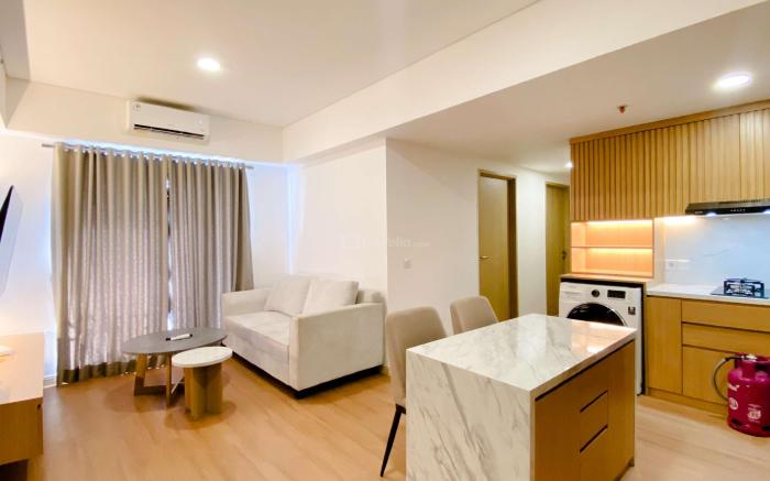 Homey 2BR with Work Space at Meikarta By Travelio