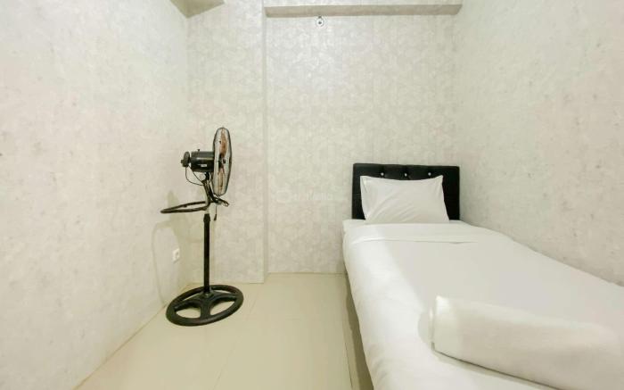 Comfort 2BR Apt Green Pramuka City By Travelio