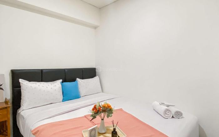 Warm & Homey 2BR at Meikarta By Travelio