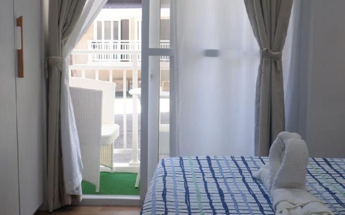 Near Mactan Airport Cozy Condo Amani Grand 121B