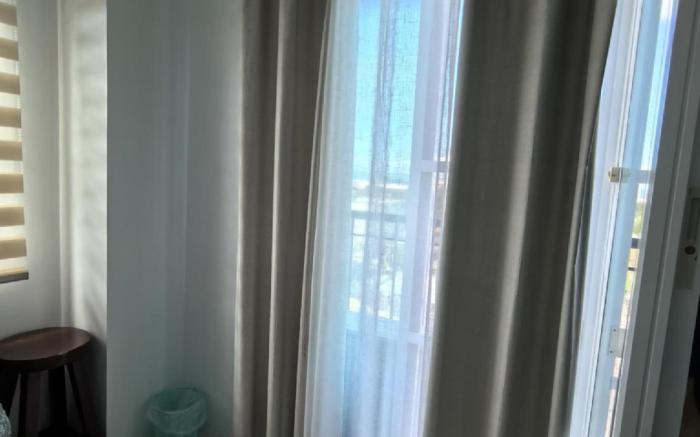 Two-bedroom Cityscape Bacolod 1001  w/ Pool Access