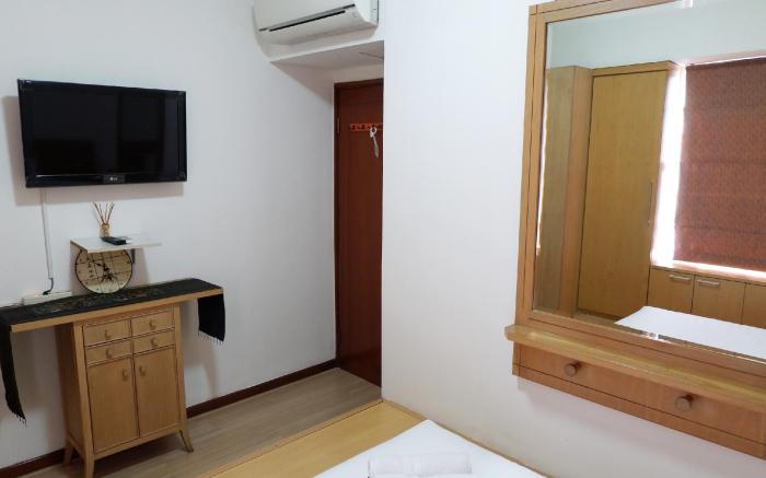 Apt 3BR  at Sudirman Tower Condominium By Travelio