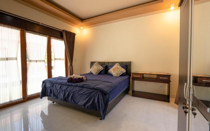 Calm Haven Villa with Amabela Garden Lovina Mitra RedDoorz