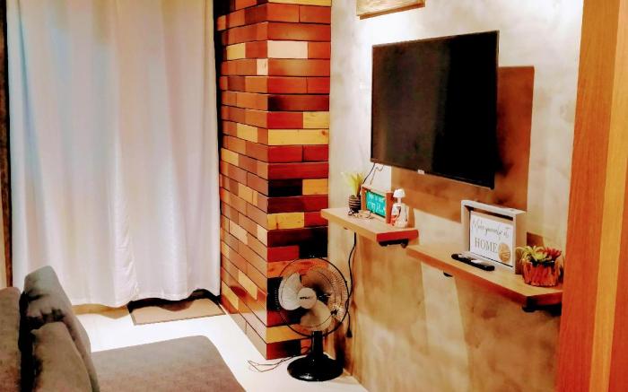 Luxury Industrial-themed Condo in Fame Residences