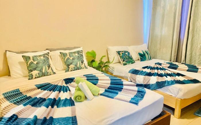 Mactan Newtown  1Br w/ 3beds with pool access