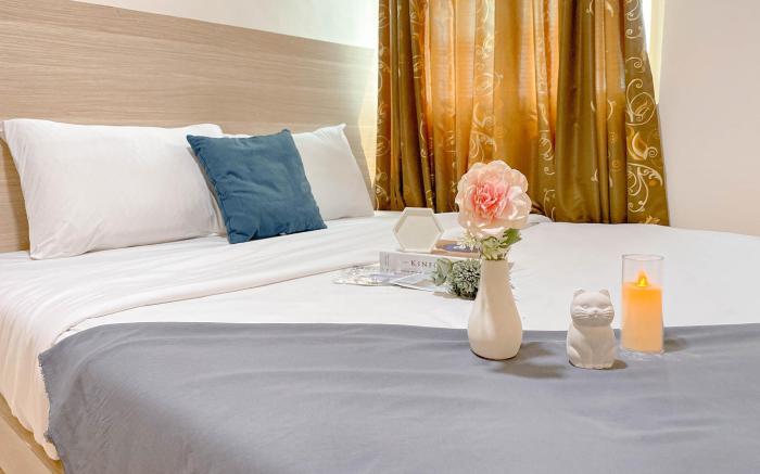 Tranquil Homey 2BR Green Pramuka City By Travelio