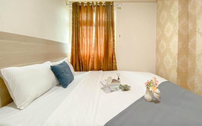 Tranquil Homey 2BR Green Pramuka City By Travelio