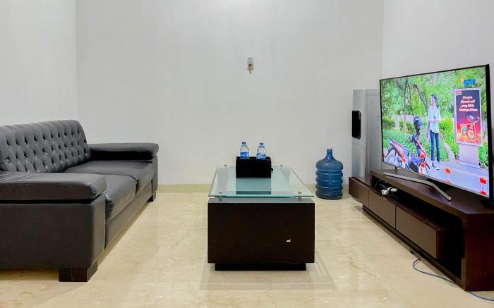 Simply Look 1BR L'Avenue Pancoran Apt By Travelio