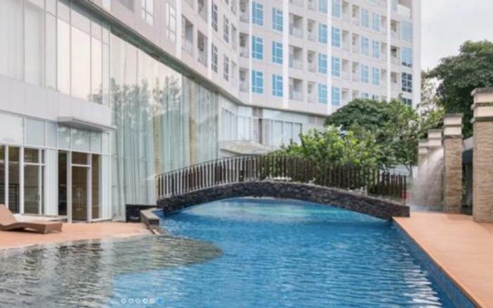 Best Living 2BR @Grand Sungkono Lagoon By Travelio