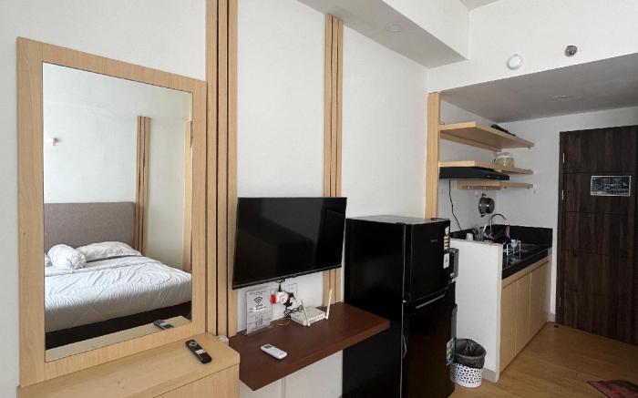 Altuz Apartemen with Netflix by sewasantai.room