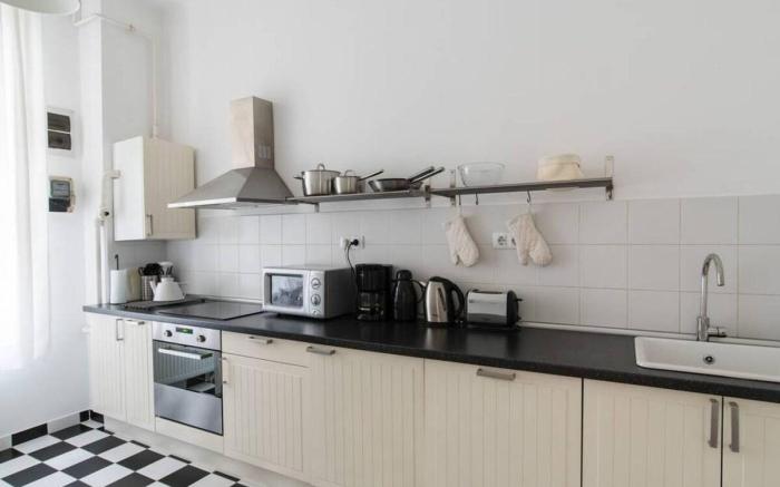 Black & white apt w/ 3 separate bedrooms in center