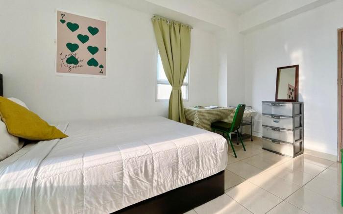 Sun-Kissed, Breezy Studio with a Green Glow