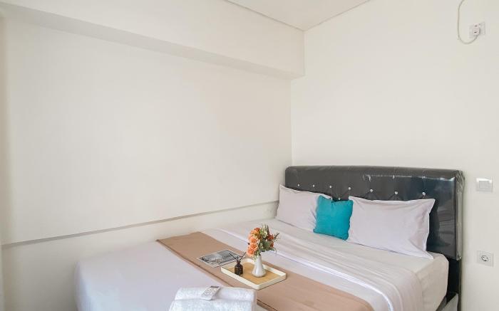 Relaxing Cozy Living 2BR Meikarta Apt By Travelio