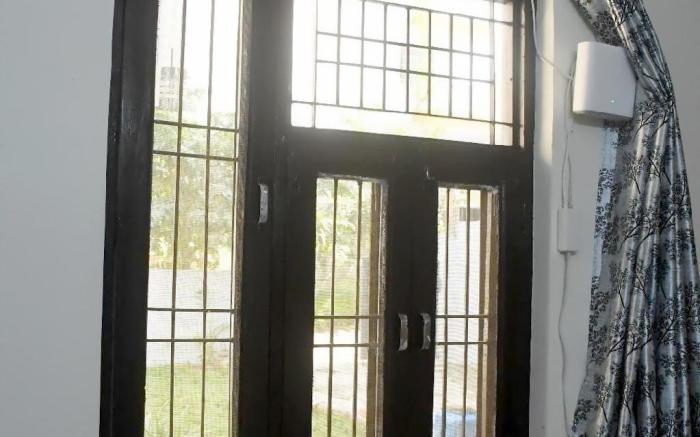 JVS Zone-2bhk Farmvilla with big lawn in 63A Noida