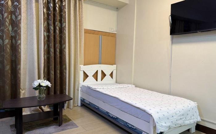 Staycation Unit at Newport Pasay T3 2 Beds w/ Wifi