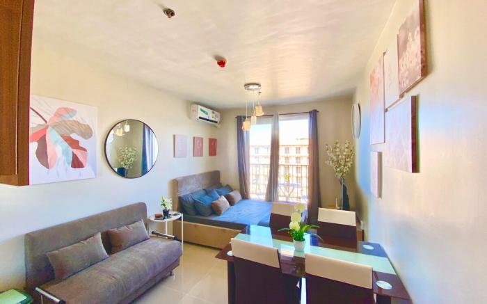 Cozy Condo near Airport, with Pool & Sea View